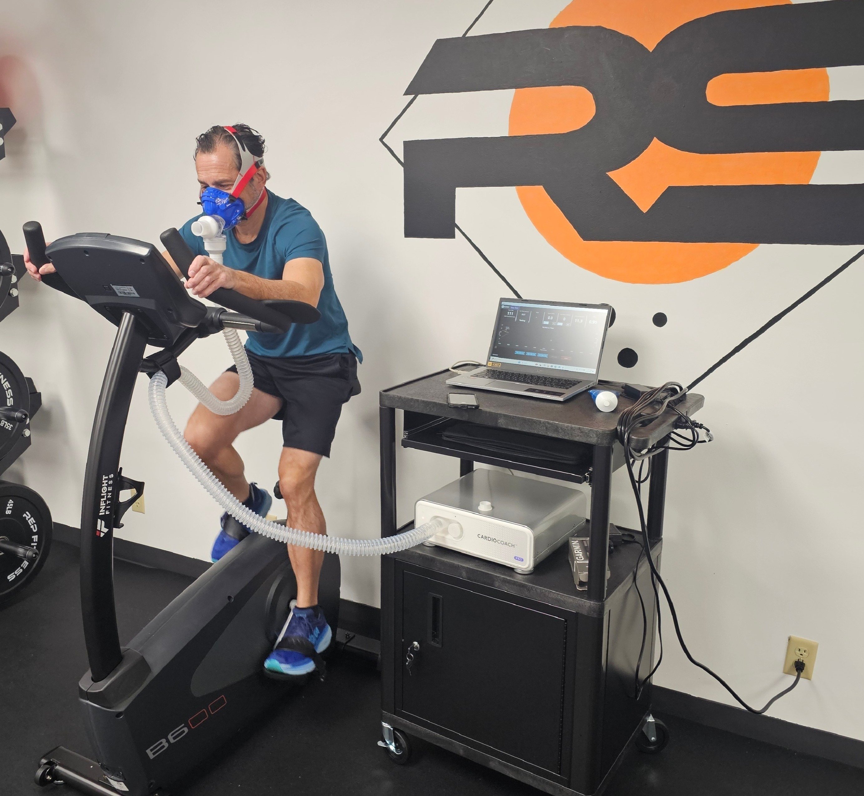 A man on an exercise bike completing a VO2 exercise test